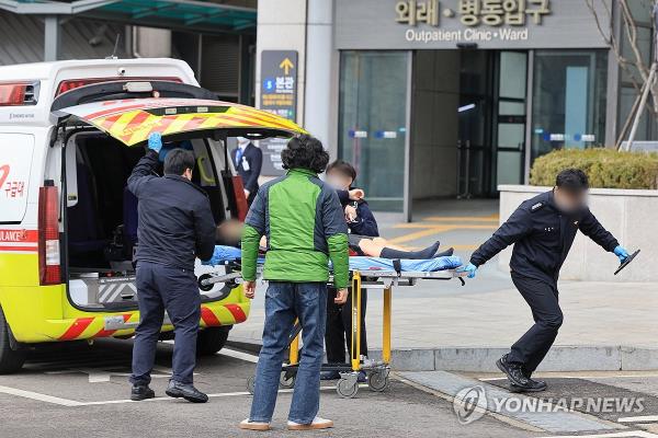 A patient is being transported to an intensive care unit at a general hospital in Seoul on Feb. 25, 2024. (Yonhap)