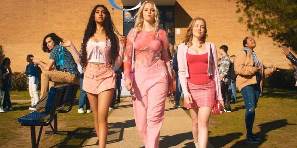 The clique from Mean Girls 2024 is walking outside the school