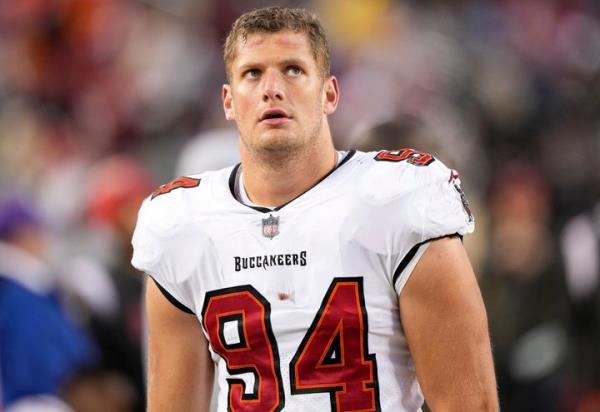 Carl Nassib of the Tampa Bay Buccaneers looks on from the sidelines during the fourth quarter against the San Francisco 49ers at Levi's Stadium, Dec. 11, 2022, in Santa Clara, California.
