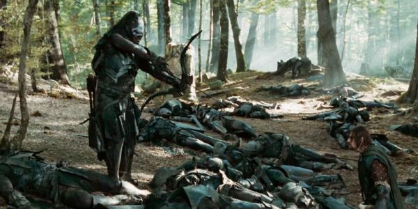 Lurtz (Lawrence Makoare) drawing back his bow string before shooting Boromir (Sean Bean) in The Lord of the Rings_ The Fellowship of the Ring