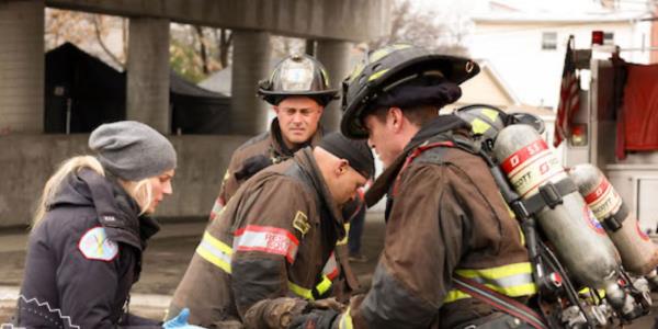 Kara Killmer's Brett, Taylor Kinney's Severide, , and Jake Lockett's Carver in Chicago Fire season 12