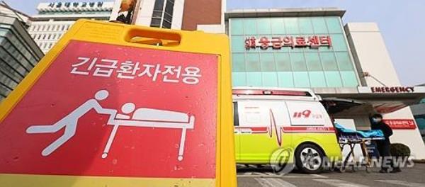 Medical officials take a rest at a general hospital in Seoul on Feb. 26, 2024. (Yonhap)