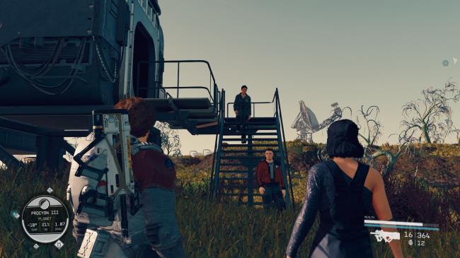 Several people walking around an outpost on a planet.