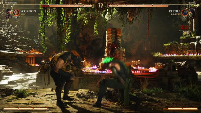 A screenshot of Reptile hitting Scorpion.