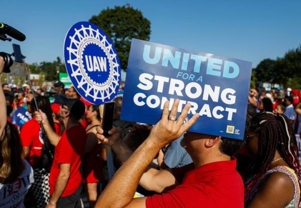 DETROIT, MICHIGAN - SEPTEMBER 4: United Auto Workers members and others gather for a rally after marching in the Detroit Labor Day Parade on September 4, 2023 in Detroit, Michigan. The theme of this year's Parade is,