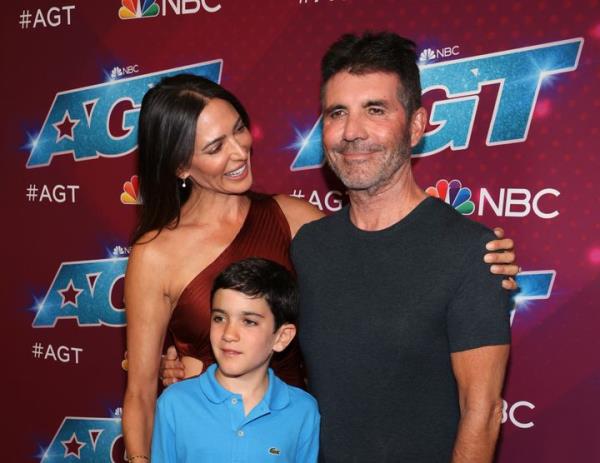 Lauren Silverman, Eric Cowell and Simon Cowell attend the red carpet for the