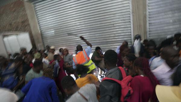 Chaos at jobs fair in Zimbabwe underscores desperation for work