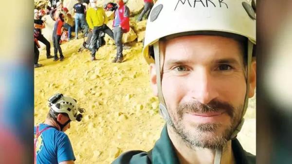 American explorer trapped 3,000 feet deep in cave awaits difficult rescue